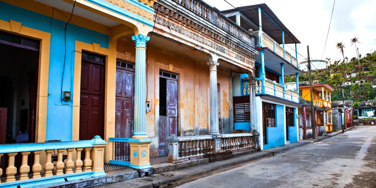 Pastel buildings in historic Baracoa Cuba.