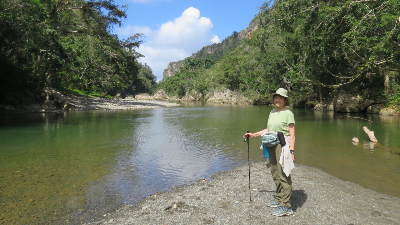 Woman standing next to a river in Eastern Cuba