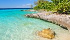 Turquoise waters and rocky shoreline along the Bay of Pigs in Eastern Cuba, showcasing the island’s stunning coastal scenery.